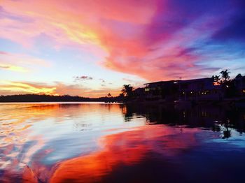 Scenic view of lake against sky during sunset