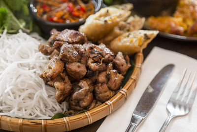 High angle view of meat in plate on table