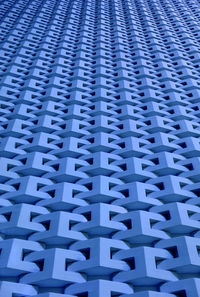 Low angle blue wall 3d pattern surface for background and banner