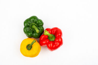 Close-up of bell peppers against white background