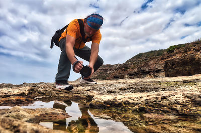 Man standing on rock