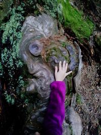 Close-up of woman standing in pond