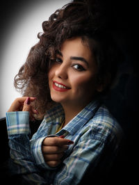 Portrait of young woman looking away