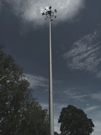 Low angle view of street light against sky