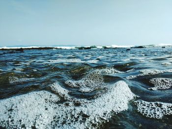 Scenic view of sea against clear sky