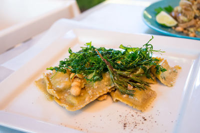 Close-up of food in plate on table