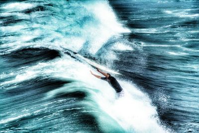 Man surfing in sea