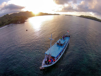 High angle view of sea against sky during sunset