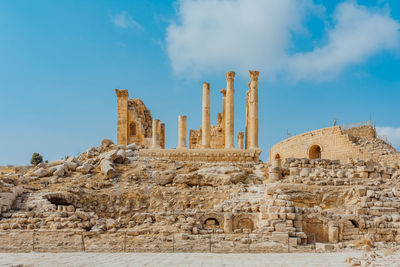 Old ruins of building against sky