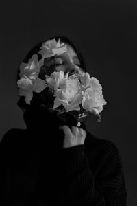 Close-up of flower bouquet against black background