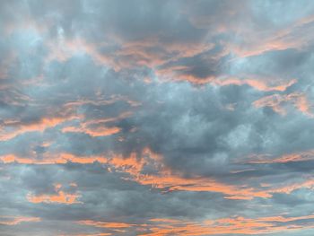 Low angle view of dramatic sky during sunset