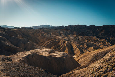 Scenic view of mountains against clear sky