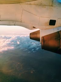 Airplane wing against sky