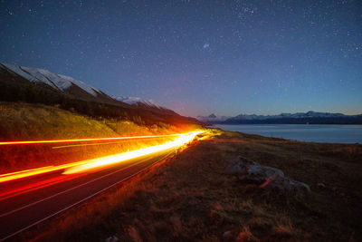 Light trails on road at night