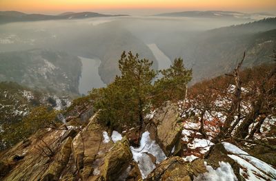 Scenic view of mountains against sky during winter