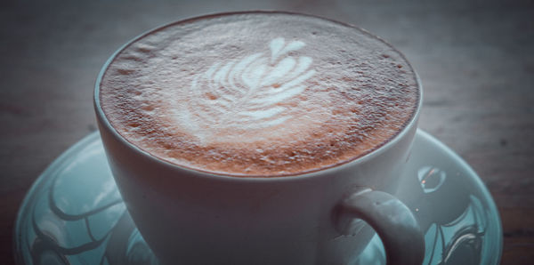 High angle view of cappuccino on table