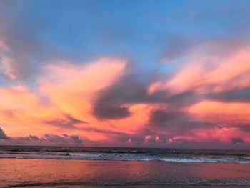 Scenic view of sea against sky at sunset