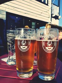 Close-up of beer glass on table