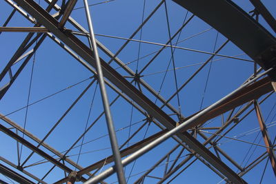 Low angle view of metallic structure against sky