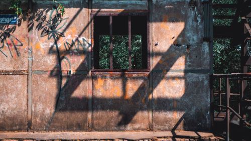 Graffiti on wall of abandoned building