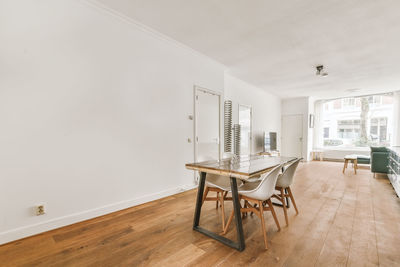 Empty chairs and table at home