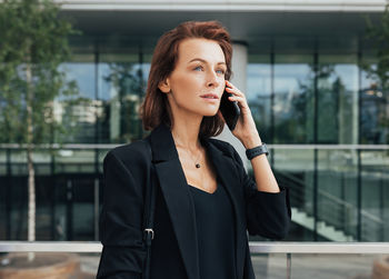 Businesswoman talking on mobile phone