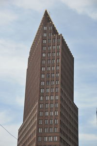 Low angle view of modern building against sky