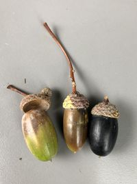 Close-up of fruits on table against white background