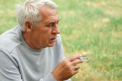 Side view of man looking away