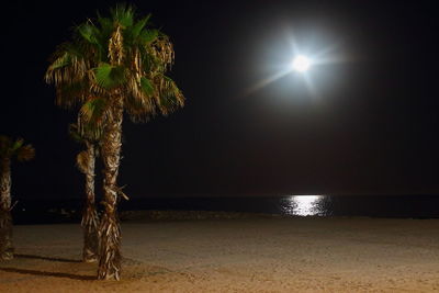 Scenic view of sea against sky at night