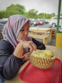 Close-up of fresh durian fruit on the table