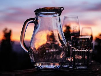 Close-up of glasses on table