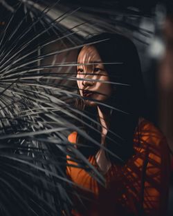 Young woman in hair at night