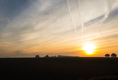 Scenic view of silhouette landscape against sky during sunset