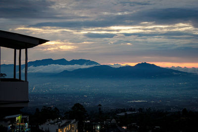 Scenic view of mountains against sky during sunset