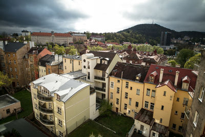 Aerial view of cityscape against sky
