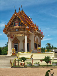 Facade of historic building against sky