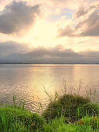 Scenic view of sea against sky during sunset