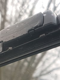 Close-up of car against sky