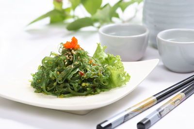 Close-up of salad in plate on table