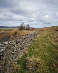 Scenic view of land against sky