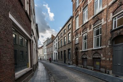 Street in city against sky