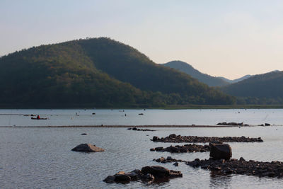 Scenic view of sea against clear sky