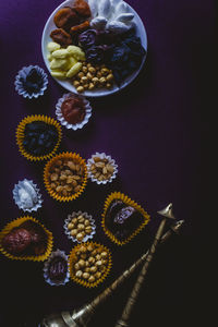 Directly above shot of dried fruits in plate on table