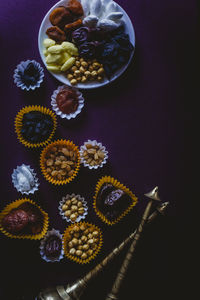 High angle view of fruits in plate on table