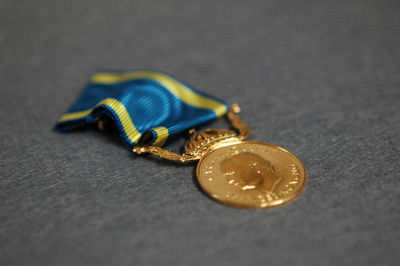 High angle view of medal on table