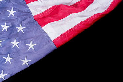 High angle view of flag against black background