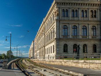 View of street and buildings against sky