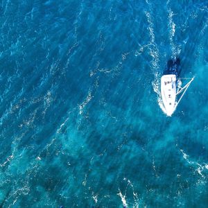 Full frame shot of water surface and boat