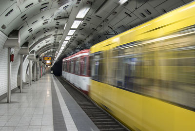 Blurred motion of train at subway station